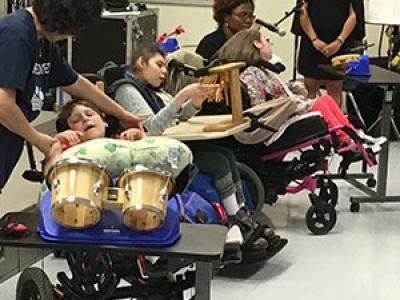 Classroom 6 performs music with their adapted musical instruments